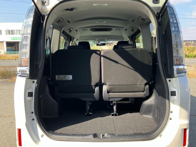 ヴォクシー ハイブリッドV 両側パワースライドドア/モデリスタエアロ/横滑防止/おくだけ充電/リアヒーター/ナビ/Bluetooth/DVD再生/バックカメラ/前席シートヒーター/ビルトインETC/オート電動格納サイドミラー(56枚目)