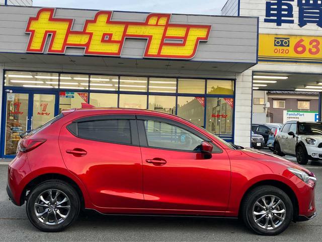 デミオ １３Ｓツーリング　４ＷＤ／衝突軽減ブレーキ／横滑防止／純正エンジンスターター／前席シートヒーター／ナビ／フルセグＴＶ／ブルートゥース／ＤＶＤ再生／バックカメラ／オート電動格納サイドミラー／オートライト／アイドリングス（6枚目）