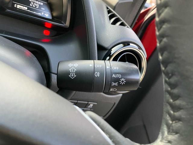 デミオ １３Ｓツーリング　４ＷＤ／衝突軽減ブレーキ／横滑防止／純正エンジンスターター／前席シートヒーター／ナビ／フルセグＴＶ／ブルートゥース／ＤＶＤ再生／バックカメラ／オート電動格納サイドミラー／オートライト／アイドリングス（26枚目）