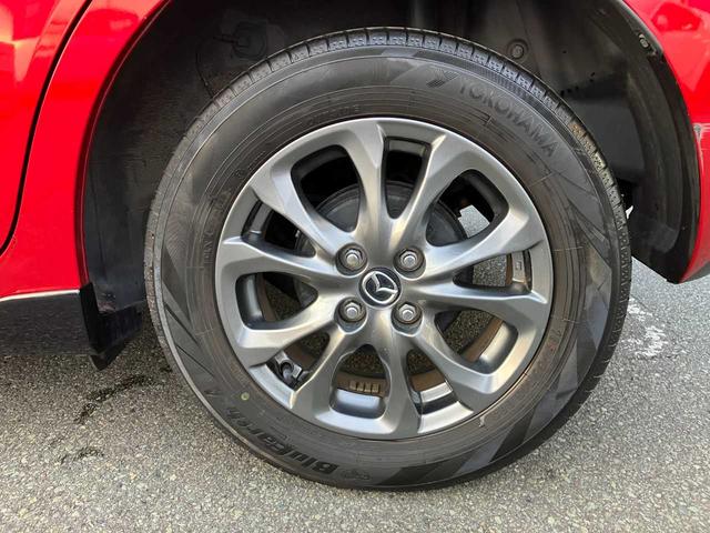 デミオ １３Ｓツーリング　４ＷＤ／衝突軽減ブレーキ／横滑防止／純正エンジンスターター／前席シートヒーター／ナビ／フルセグＴＶ／ブルートゥース／ＤＶＤ再生／バックカメラ／オート電動格納サイドミラー／オートライト／アイドリングス（55枚目）