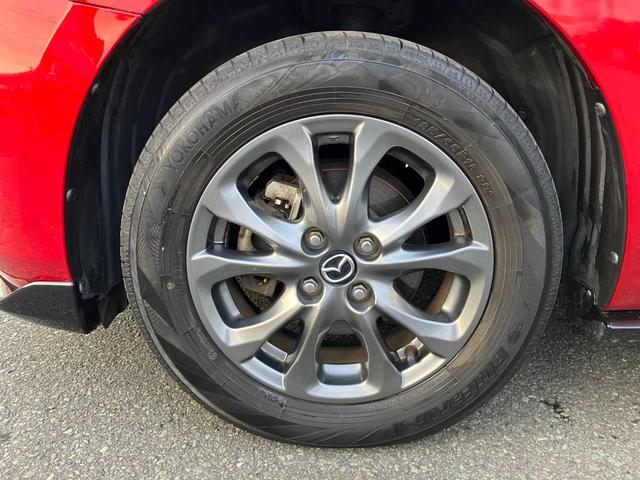 デミオ １３Ｓツーリング　４ＷＤ／衝突軽減ブレーキ／横滑防止／純正エンジンスターター／前席シートヒーター／ナビ／フルセグＴＶ／ブルートゥース／ＤＶＤ再生／バックカメラ／オート電動格納サイドミラー／オートライト／アイドリングス（56枚目）