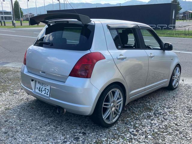 スイフト １．３ＸＧ　ドライブレコーダー　バックカメラ　ＴＶ　アルミホイール　キーレスエントリー　電動格納ミラー　ＡＴ　盗難防止システム　衝突安全ボディ　ＡＢＳ　ＣＤ　ＤＶＤ再生　ミュージックプレイヤー接続可　エアコン（15枚目）