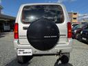 ジムニー XG 切替4WD ターボ 5速マニュアル リフトアップ 社外マフラー CDデッキ キーレスエントリー ETC ルームミラー内蔵レーダー 中古車画像_4