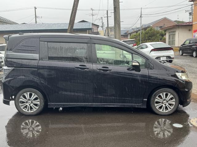 フリードスパイクハイブリッド ジャストセレクション 両側オートスライドドア 純正ナビゲーションTV ビルトインETC 純正15インチアルミホイール(7枚目)