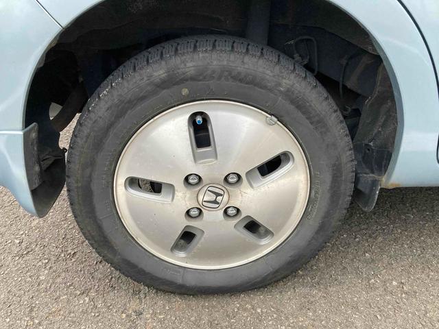 ゼスト W 4WD キーレスエントリー ベンチシート AT ABS アルミホイール 衝突安全ボディ エアコン(25枚目)