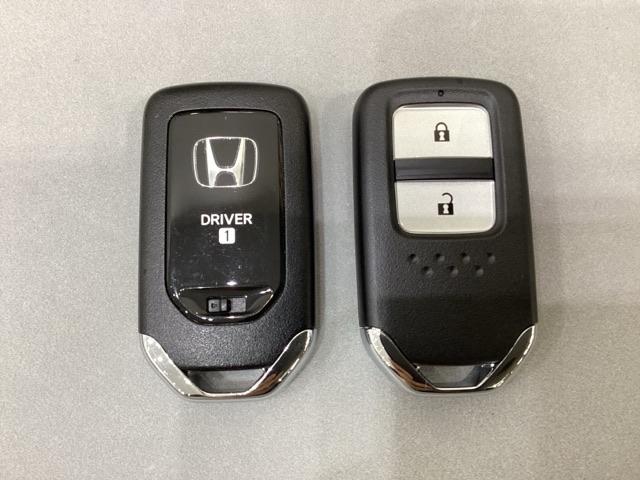 フィット ｅ：ＨＥＶホーム　純正メモリーナビ、中古スタッドレスタイヤ、ドライブレコーダー前後装着＋ＥＴＣ付　当社デモカー（14枚目）