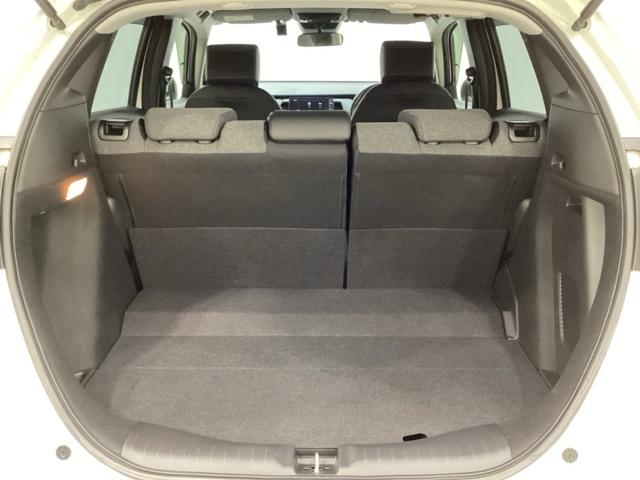 フィット ｅ：ＨＥＶホーム　純正メモリーナビ　純正アルミホイール　ドライブレコーダー　ホンダセンシング　クルーズコントロール　衝突軽減ブレーキ　横滑り防止　障害物センサー　バックカメラ　盗難防止　ＬＥＤヘッドライト　４ＷＤ（26枚目）