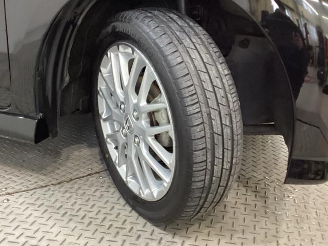 N-BOXカスタム Lターボ 純正メモリーナビ 純正アルミホイール エンジンスターター シートヒーター 両側電動スライドドア ホンダセンシング クルーズコントロール 衝突軽減ブレーキ 横滑り防止 障害物センサー バックカメラ(27枚目)