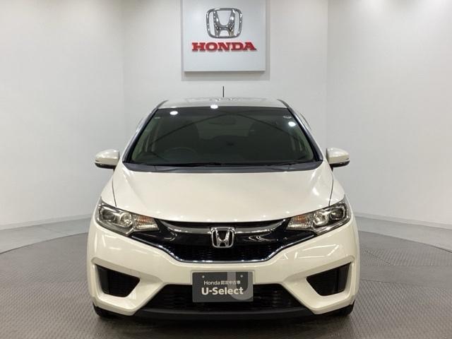 フィットハイブリッド Ｆパッケージ　純正メモリーナビ　フルセグＴＶ　Ｂｌｕｅｔｏｏｔｈ　バックカメラ　ＥＴＣ　純正エンジンスターター　社外アルミホイール　盗難防止システム　キーレスエントリー　スマートキー（2枚目）