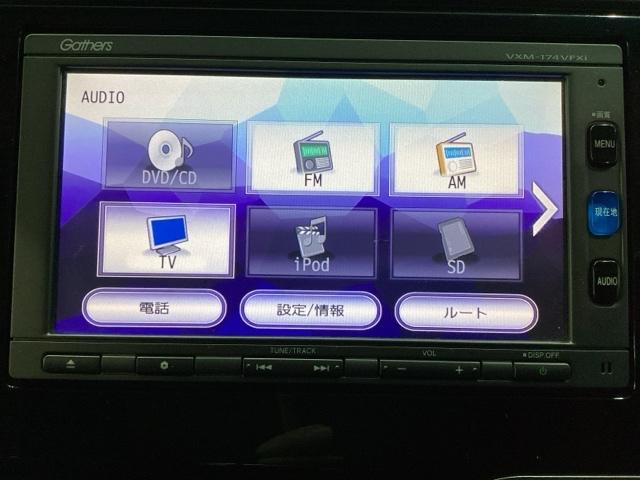 フィットハイブリッド Ｆパッケージ　純正メモリーナビ　フルセグＴＶ　Ｂｌｕｅｔｏｏｔｈ　バックカメラ　ＥＴＣ　純正エンジンスターター　社外アルミホイール　盗難防止システム　キーレスエントリー　スマートキー（6枚目）