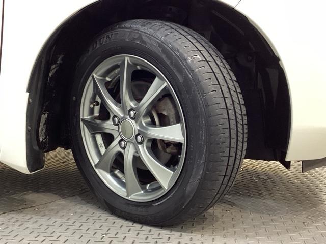 フィットハイブリッド Ｆパッケージ　純正メモリーナビ　フルセグＴＶ　Ｂｌｕｅｔｏｏｔｈ　バックカメラ　ＥＴＣ　純正エンジンスターター　社外アルミホイール　盗難防止システム　キーレスエントリー　スマートキー（22枚目）