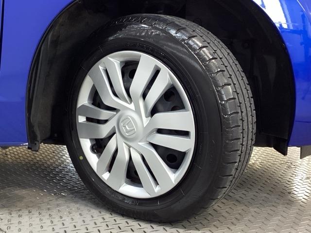 フィット １３Ｇ・Ｆパッケージ　純正メモリーナビ　キーレス　　いまコレ＋新品フロアマット付　横滑り防止　盗難防止　４ＷＤ　純正スチールホイール　スマートキー　キーレスエントリー　アイドリングストップ（21枚目）