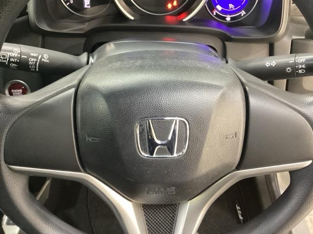 フィット １３Ｇ・Ｆパッケージ　純正アルミホイール　キーレス　スマートキー　盗難防止　４ＷＤ（10枚目）