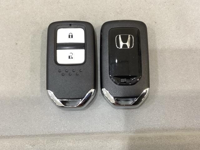 フィット １３Ｇ・Ｆパッケージ　純正アルミホイール　キーレス　スマートキー　盗難防止　４ＷＤ（11枚目）