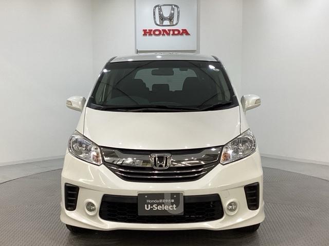 フリード Gジャストセレクション 純正メモリーナビ 社外アルミホイール 社外エンジンスターター 両側電動スライドドア 横滑り防止 バックカメラ 盗難防止 4WD(2枚目)