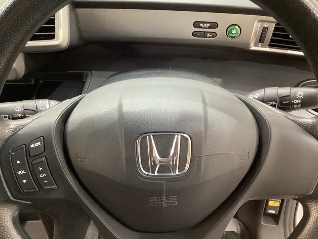 フリード Gジャストセレクション 純正メモリーナビ 社外アルミホイール 社外エンジンスターター 両側電動スライドドア 横滑り防止 バックカメラ 盗難防止 4WD(11枚目)