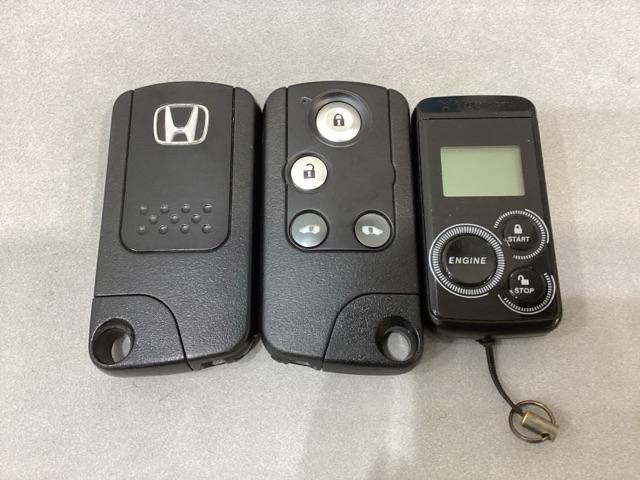 フリード Gジャストセレクション 純正メモリーナビ 社外アルミホイール 社外エンジンスターター 両側電動スライドドア 横滑り防止 バックカメラ 盗難防止 4WD(12枚目)