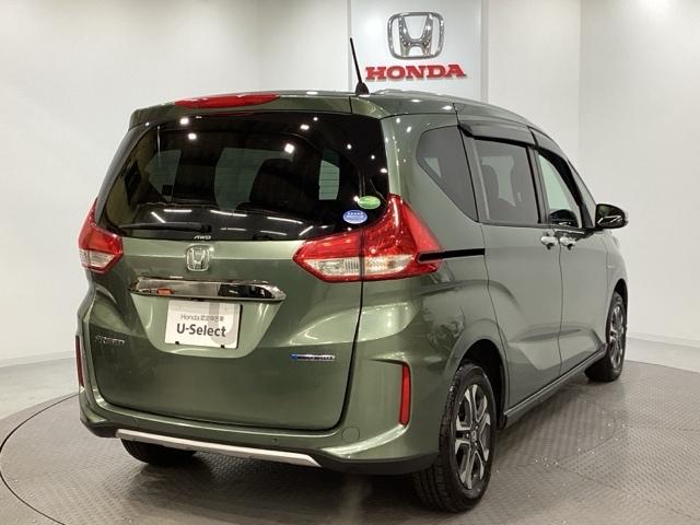 フリードハイブリッド ハイブリッド・クロスターホンダセンシング　４ＷＤ　両側電動スライドドア　光触媒抗菌消臭施工済　ドライブレコーダー　メモリーナビ　フルセグＴＶ　Ｂｌｕｅｔｏｏｔｈ接続　バックカメラ　スマートキー　衝突被害軽減システム　盗難防止システム（3枚目）
