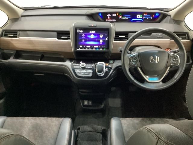 フリードハイブリッド ハイブリッド・クロスターホンダセンシング　４ＷＤ　両側電動スライドドア　光触媒抗菌消臭施工済　ドライブレコーダー　メモリーナビ　フルセグＴＶ　Ｂｌｕｅｔｏｏｔｈ接続　バックカメラ　スマートキー　衝突被害軽減システム　盗難防止システム（5枚目）