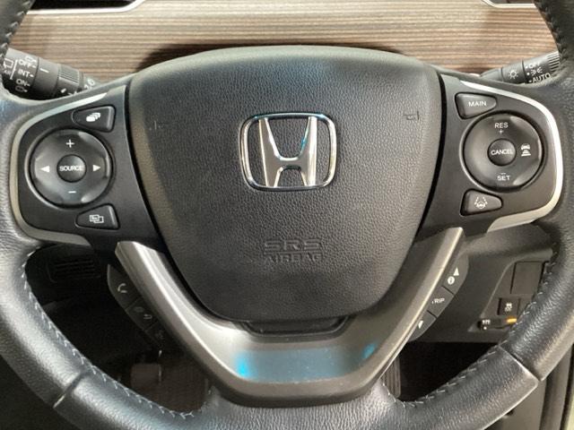 フリードハイブリッド ハイブリッド・クロスターホンダセンシング　４ＷＤ　両側電動スライドドア　光触媒抗菌消臭施工済　ドライブレコーダー　メモリーナビ　フルセグＴＶ　Ｂｌｕｅｔｏｏｔｈ接続　バックカメラ　スマートキー　衝突被害軽減システム　盗難防止システム（11枚目）