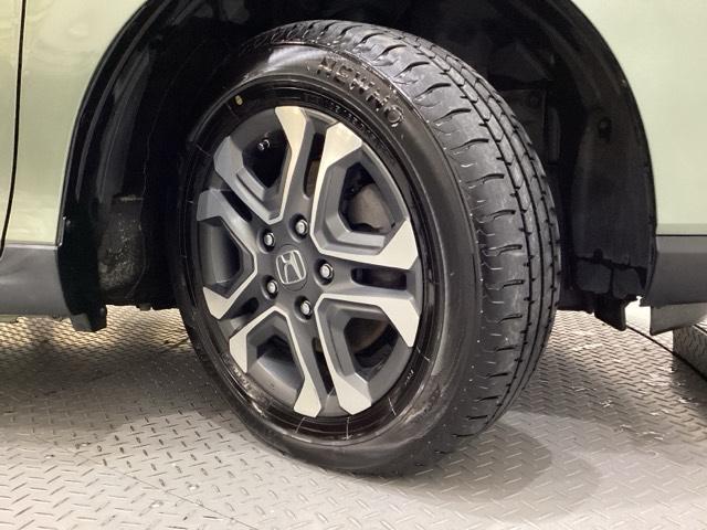 フリードハイブリッド ハイブリッド・クロスターホンダセンシング　４ＷＤ　両側電動スライドドア　光触媒抗菌消臭施工済　ドライブレコーダー　メモリーナビ　フルセグＴＶ　Ｂｌｕｅｔｏｏｔｈ接続　バックカメラ　スマートキー　衝突被害軽減システム　盗難防止システム（26枚目）