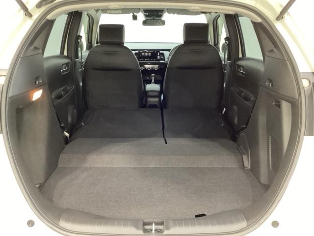 フィット ｅ：ＨＥＶホーム　純正メモリーナビ　ドライブレコーダー　キーレス　ホンダセンシング　クルーズコントロール　衝突軽減ブレーキ　横滑り防止　障害物センサー　盗難防止　バックカメラ　ＬＥＤヘッドライト　４ＷＤ（27枚目）