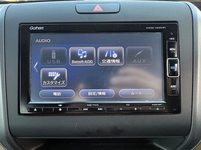 フリードハイブリッド ハイブリッド・Ｇホンダセンシング　４ＷＤ　純正ナビ　フルセグＴＶ　Ｂｌｕｅｔｏｏｔｈ　バックカメラ　純正エンジンスターター　ＥＴＣ　両側パワースライドドア（5枚目）