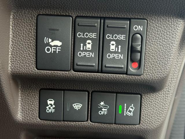 フリードハイブリッド ハイブリッド・Ｇホンダセンシング　４ＷＤ　純正ナビ　フルセグＴＶ　Ｂｌｕｅｔｏｏｔｈ　バックカメラ　純正エンジンスターター　ＥＴＣ　両側パワースライドドア（8枚目）