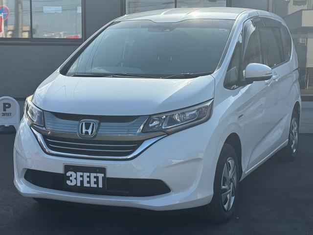 フリードハイブリッド ハイブリッド・Ｇホンダセンシング　４ＷＤ　純正ナビ　フルセグＴＶ　Ｂｌｕｅｔｏｏｔｈ　バックカメラ　純正エンジンスターター　ＥＴＣ　両側パワースライドドア（12枚目）