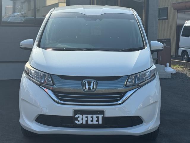 フリードハイブリッド ハイブリッド・Ｇホンダセンシング　４ＷＤ　純正ナビ　フルセグＴＶ　Ｂｌｕｅｔｏｏｔｈ　バックカメラ　純正エンジンスターター　ＥＴＣ　両側パワースライドドア（13枚目）