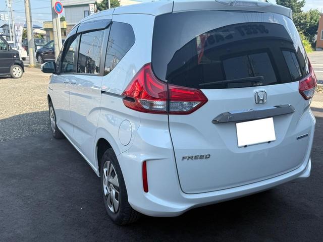 フリードハイブリッド ハイブリッド・Ｇホンダセンシング　４ＷＤ　純正ナビ　フルセグＴＶ　Ｂｌｕｅｔｏｏｔｈ　バックカメラ　純正エンジンスターター　ＥＴＣ　両側パワースライドドア（19枚目）