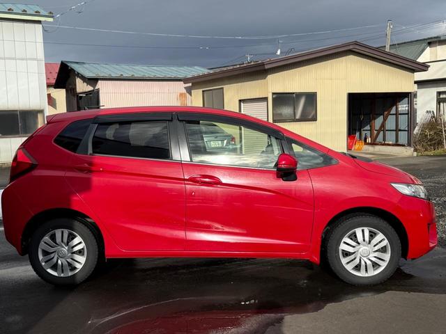 フィット １３Ｇ・Ｌパッケージ　４ＷＤ　保証１年走行無制限　ナビ　フルセグＴＶ　Ｂｌｕｅｔｏｏｔｈ　バックカメラ　ＤＶＤ　ＣＤ　Ｐスタート　禁煙　寒冷地仕様（17枚目）