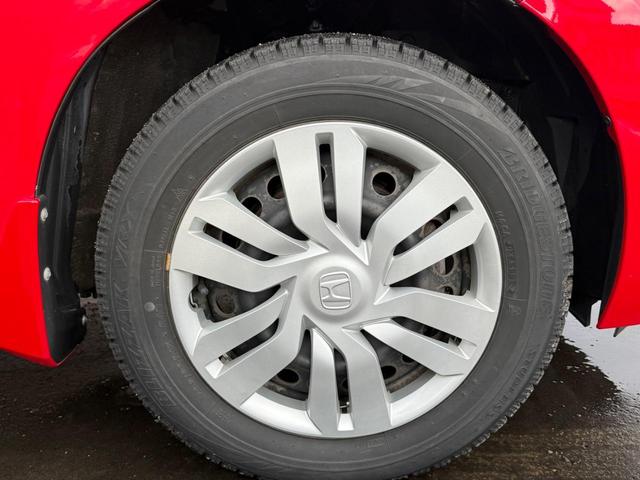 フィット １３Ｇ・Ｌパッケージ　４ＷＤ　保証１年走行無制限　ナビ　フルセグＴＶ　Ｂｌｕｅｔｏｏｔｈ　バックカメラ　ＤＶＤ　ＣＤ　Ｐスタート　禁煙　寒冷地仕様（37枚目）