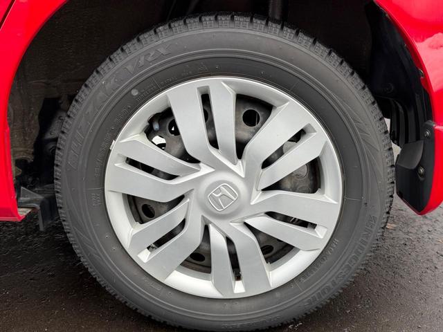 フィット １３Ｇ・Ｌパッケージ　４ＷＤ　保証１年走行無制限　ナビ　フルセグＴＶ　Ｂｌｕｅｔｏｏｔｈ　バックカメラ　ＤＶＤ　ＣＤ　Ｐスタート　禁煙　寒冷地仕様（38枚目）