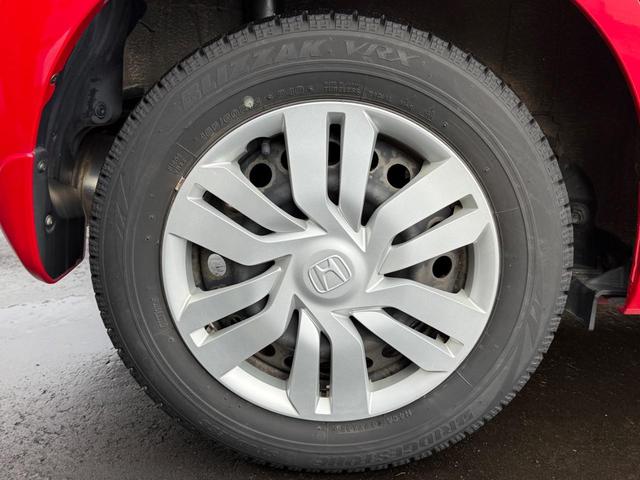 フィット １３Ｇ・Ｌパッケージ　４ＷＤ　保証１年走行無制限　ナビ　フルセグＴＶ　Ｂｌｕｅｔｏｏｔｈ　バックカメラ　ＤＶＤ　ＣＤ　Ｐスタート　禁煙　寒冷地仕様（39枚目）