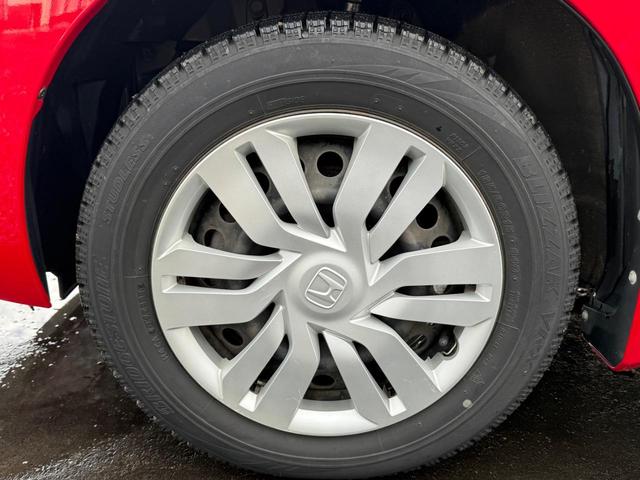 フィット １３Ｇ・Ｌパッケージ　４ＷＤ　保証１年走行無制限　ナビ　フルセグＴＶ　Ｂｌｕｅｔｏｏｔｈ　バックカメラ　ＤＶＤ　ＣＤ　Ｐスタート　禁煙　寒冷地仕様（40枚目）