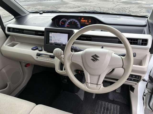 ワゴンＲ ６６０　ハイブリッド　ＦＸ　セーフティパッケージ装着車　４Ｗ　ｉストップ　フルタイム４ＷＤ　誤発進抑制装置　禁煙　ワンオーナー車　スマキー　横滑り防止装置付　ＰＳ　イモビライザー　バックモニター　ＷＳＲＳ　フルフラットシート　ＰＷ　ＥＴＣ車載器　ナビ付き　ＡＢＳ（5枚目）