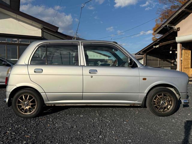 ミラジーノ ジーノ　４ＷＤ　ＥＴＣ　　ＭＴ　ＣＤ　アルミホイール　エアコン　パワーステアリング（4枚目）