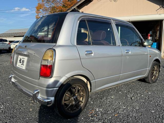 ミラジーノ ジーノ　４ＷＤ　ＥＴＣ　　ＭＴ　ＣＤ　アルミホイール　エアコン　パワーステアリング（5枚目）