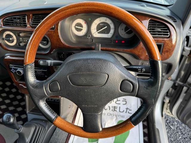 ミラジーノ ジーノ　４ＷＤ　ＥＴＣ　　ＭＴ　ＣＤ　アルミホイール　エアコン　パワーステアリング（23枚目）