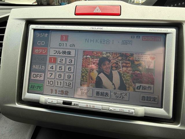 フリード Ｇ　ジャストセレクション　ＴＶ　両側スライド・片側電動　ＨＩＤ　キーレスエントリー　電動格納ミラー　３列シート　ＣＶＴ　アルミホイール　ＣＤ　衝突安全ボディ　ＡＢＳ　エアコン　パワーステアリング　パワーウィンドウ（14枚目）