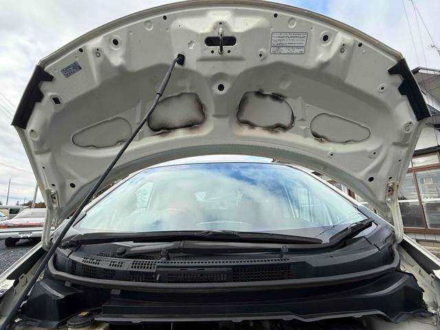 フリード Ｇ　ジャストセレクション　ＴＶ　両側スライド・片側電動　ＨＩＤ　キーレスエントリー　電動格納ミラー　３列シート　ＣＶＴ　アルミホイール　ＣＤ　衝突安全ボディ　ＡＢＳ　エアコン　パワーステアリング　パワーウィンドウ（29枚目）