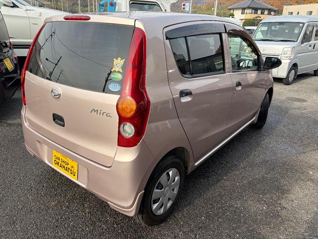 ミラ Ｘスペシャル　５速マニュアル車　走行１４０００ＫＭ　ポータブルナビ（7枚目）