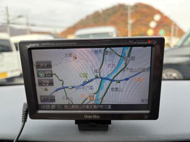 ミラ Ｘスペシャル　５速マニュアル車　走行１４０００ＫＭ　ポータブルナビ（25枚目）