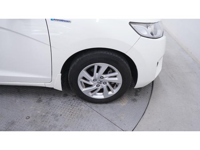 フィットハイブリッド Lパッケージ 社外ナビ フルセグTV CD/DVD再生 Bluetooth接続 バックカメラ 運転席用i-SRSエアバッグシステム&助手席用SRSエアバッグシステム LEDヘッドライト AUTOライト(51枚目)