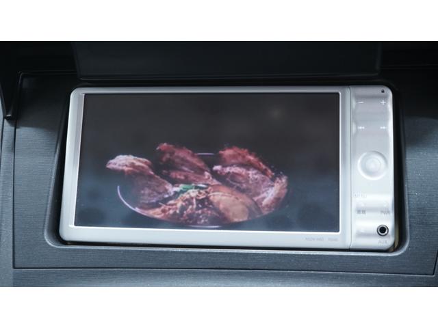 プリウス Ｓ　禁煙車　ワンオーナー　純正ナビ　地デジＴＶ　バックカメラ　スマートキー　電格ドアミラーウィンカー　社外１５インチアルミホイール　後席アームレスト兼用ドリンクホルダー　ＯＰフォグランプ　ビルトインＥＴＣ（25枚目）