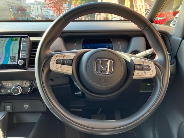 フィット e:HEVホーム 20周年特別仕様車 カーサ 純正9インチナビ 360度カメラ ETC 前後ドライブレコーダー Bluetooth接続 フルセグTV コーナーセンサー シートヒーター アダクティブクルーズコントロール 16インチアルミホイール(15枚目)