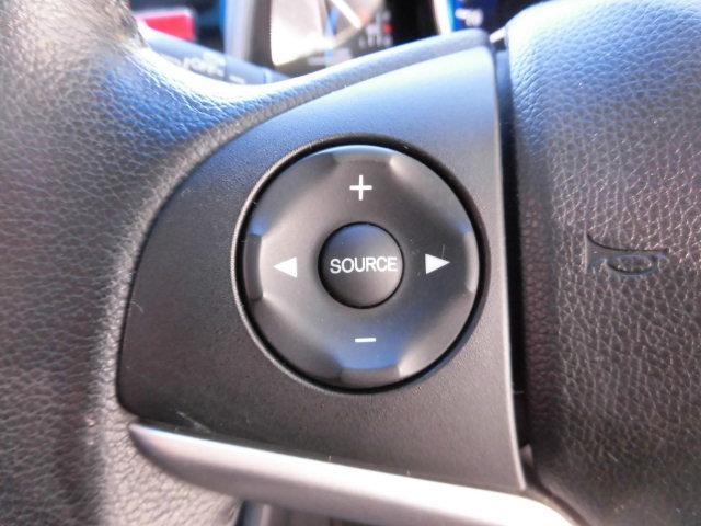 フィットハイブリッド Ｌパッケージ　ハーフレザーシート　純正ナビ　地デジＴＶ　Ｂｌｕｅｔｏｏｔｈ　ＤＶＤ再生　バックカメラ　ステアリングリモコン　クルーズコントロール　オートライト　オートエアコン　スマートキー　ＥＴＣ　禁煙車（22枚目）