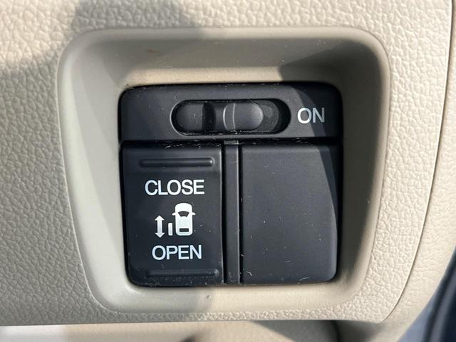 N-BOX G・Lパッケージ 電動スライドドア 禁煙車 スマートキー オートエアコン DVD再生 地デジ 電動格納ミラー ETC 衝突安全ボディ 盗難防止システム プライバシーガラス ドアバイザー 横滑り防止装置(5枚目)