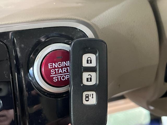 N-BOX G・Lパッケージ 電動スライドドア 禁煙車 スマートキー オートエアコン DVD再生 地デジ 電動格納ミラー ETC 衝突安全ボディ 盗難防止システム プライバシーガラス ドアバイザー 横滑り防止装置(7枚目)